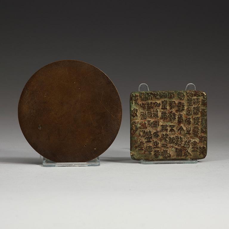 A bronze mirror, and plaque, partly Jin dynasty (1115-1234).