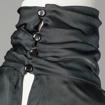 Shirt and top by Ralph Laurent.