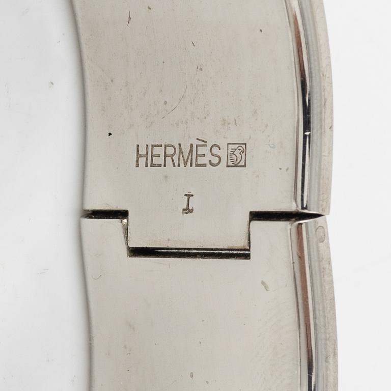 Hermès, a 'Clic Clac H' bracelet.