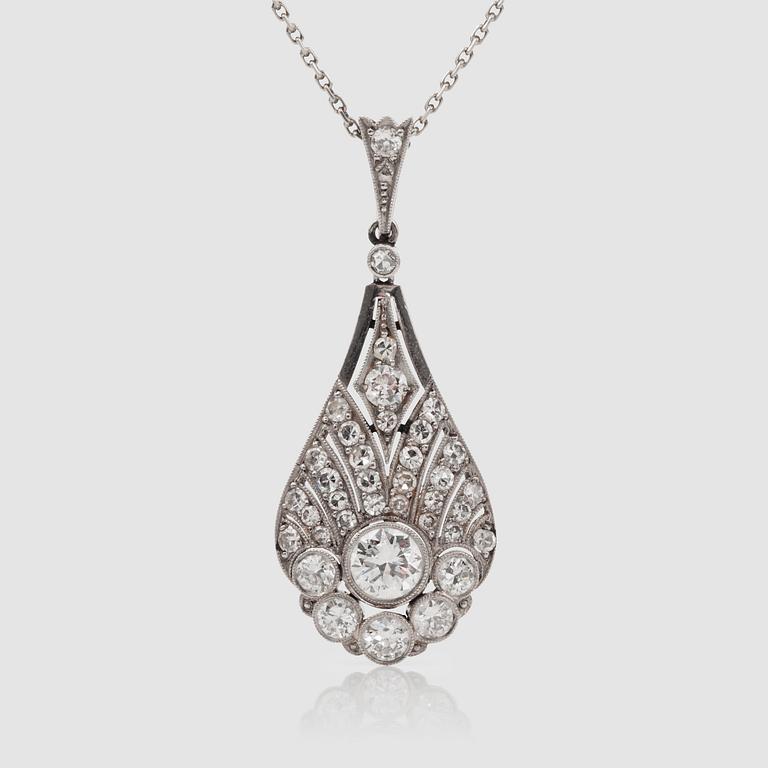A platinum and old-cut diamond necklace.