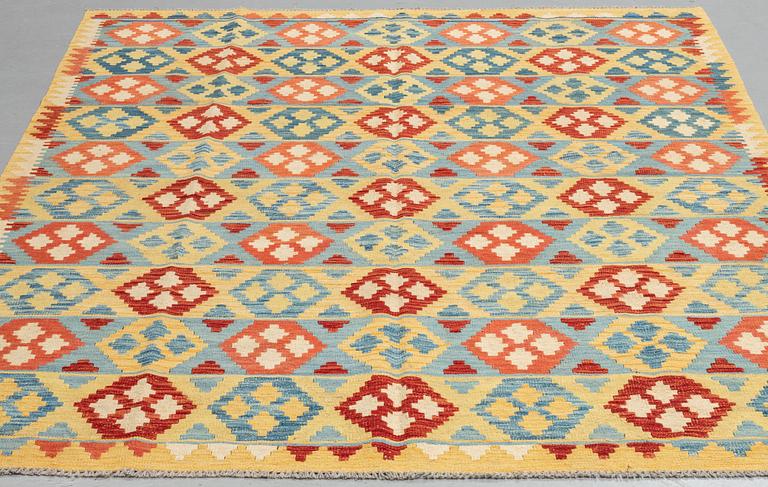 A carpet, kilim, ca 244 x 188 cm.