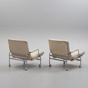 A pair of 'Karin' easy chairs by Bruno Mathsson for Dux, second half of the 20th century.