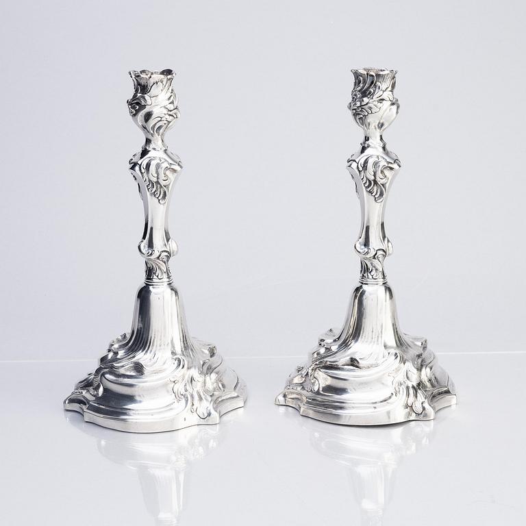 A pair of Swedish Rococo silver candlesticks, marks of Abraham Lundberg, Stockholm 1765.