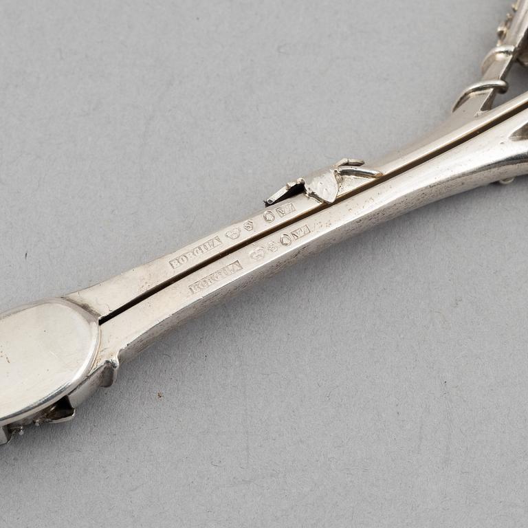 Three silver tongs, Sweden and Denmark, 1834-1923.