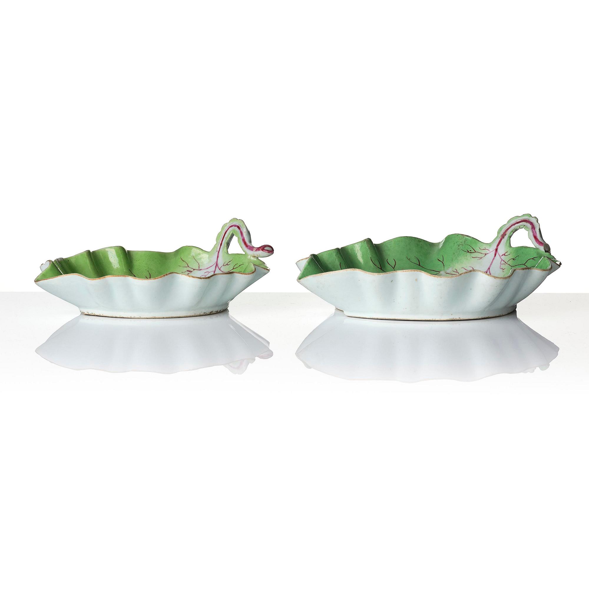 A pair of leaf shaped 'European subject' dishes, Qing dynasty, 18th century.