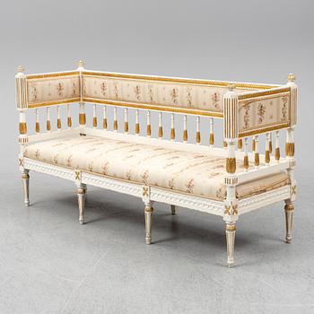 A late gustavian sofa, ca 1800.