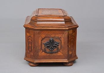 A WOODEN CHEST.