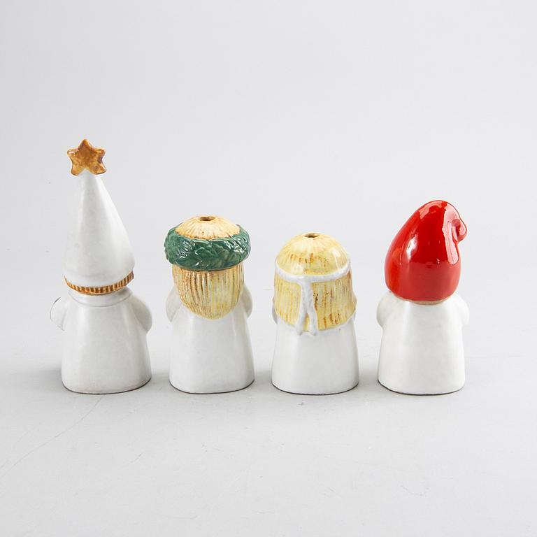 LISA LARSON, a set of four candle sticks.