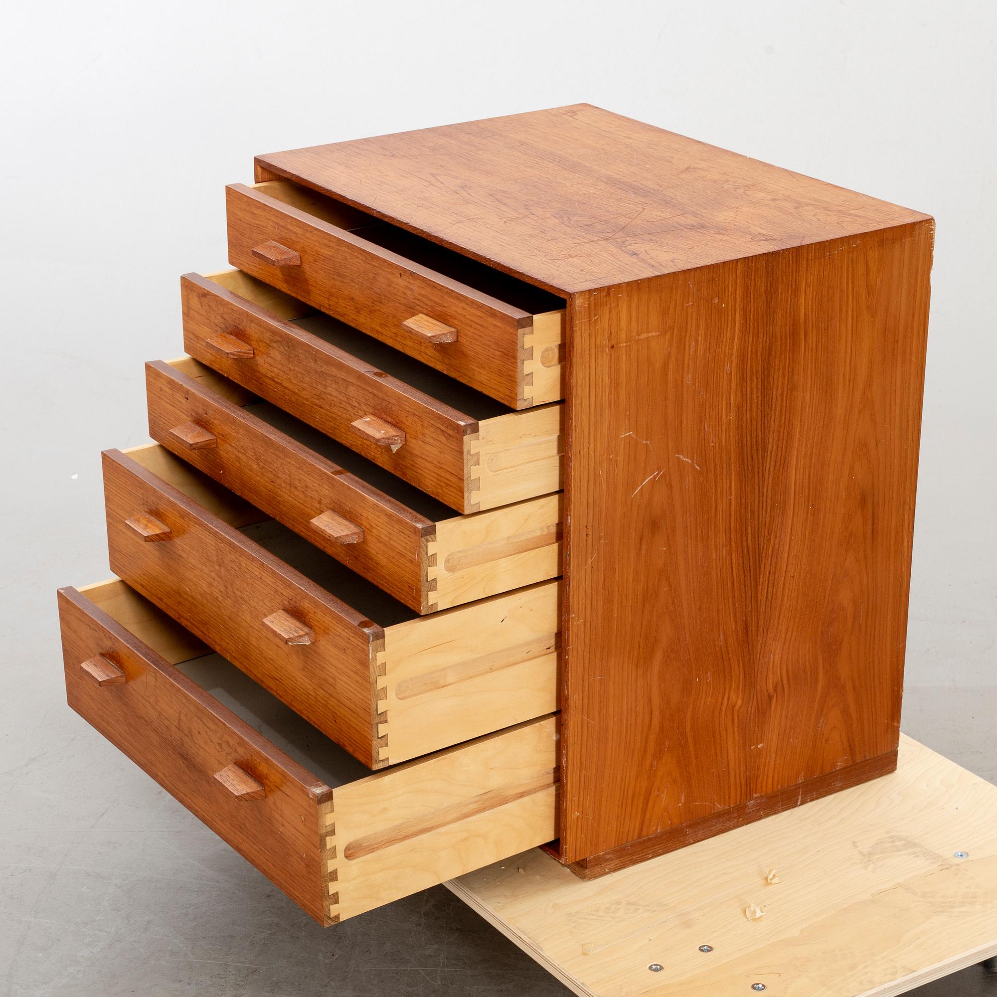 A teak veneered chest of drawers, designed by Olof Pira.