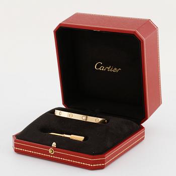 CARTIER, Love bracelet with four brilliant cut diamonds ca 0.40 ct in total.