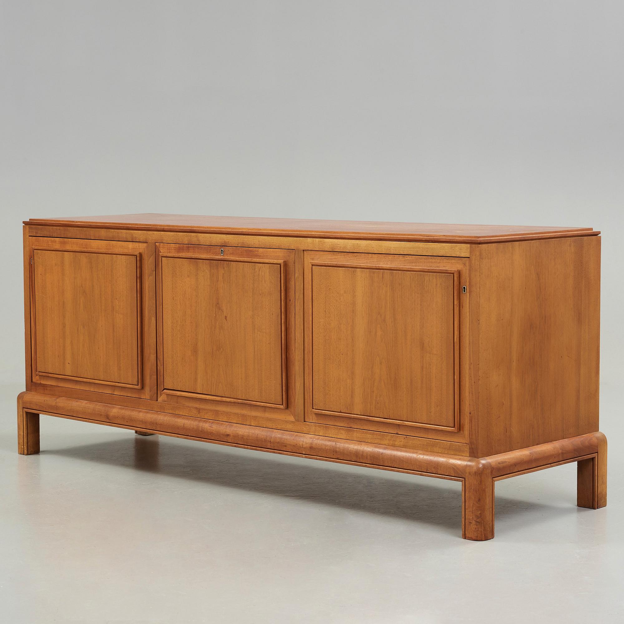 NILS AHRBOM & HELGE ZIMDAHL, a walnut sideboard, Stockholm 1932.