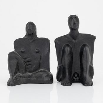 Marita Norin, skulpurer/bokstöd, ett par, monogramsignerade.