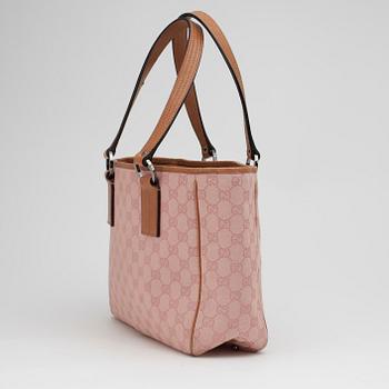 GUCCI, a pink monogram canvas handbag.