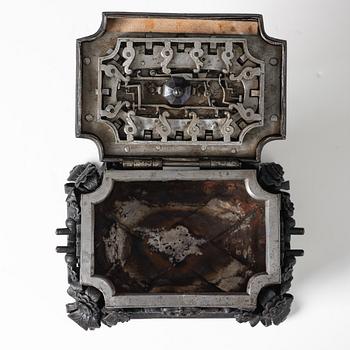 A South-German, presumably Nuremberg, Baroque iron and steel strongbox, later part of the 17th century.