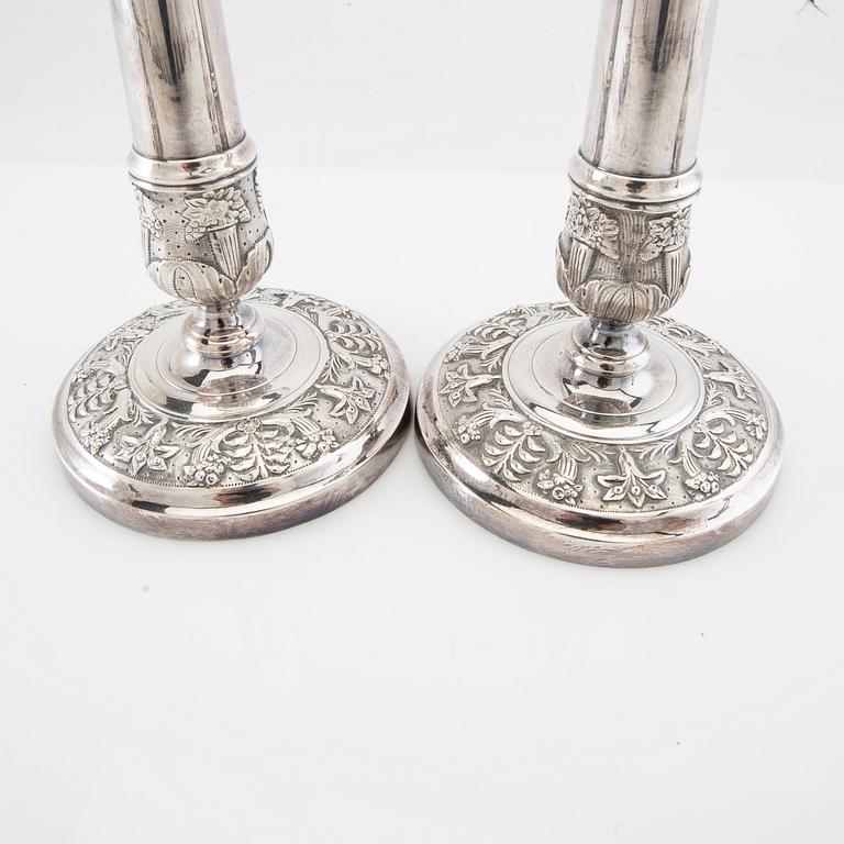 Candle holders, 2 pairs of silver-plated metal, first half of the 20th century.