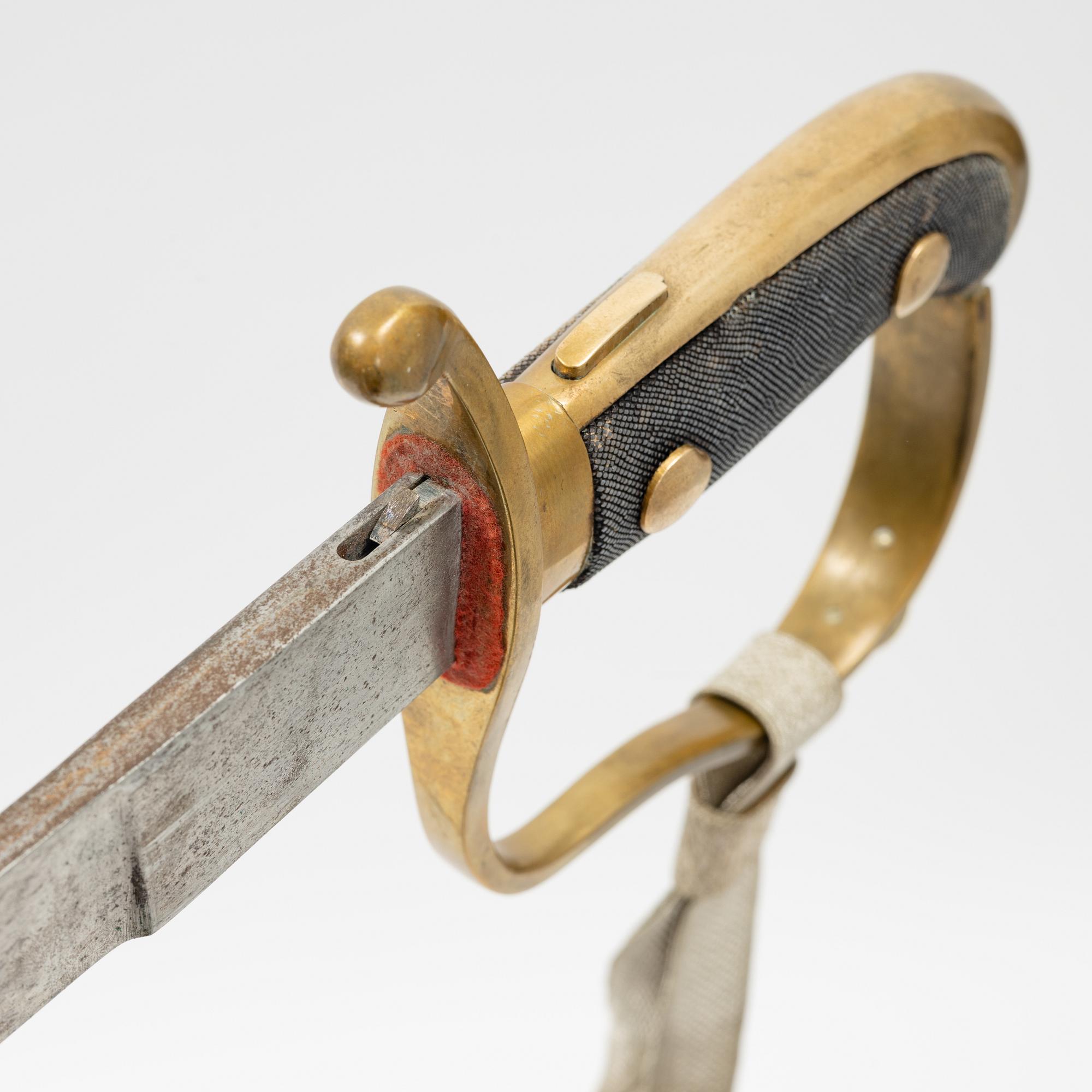 A Swedish police sabre with scabbard, drom around the year 1900.