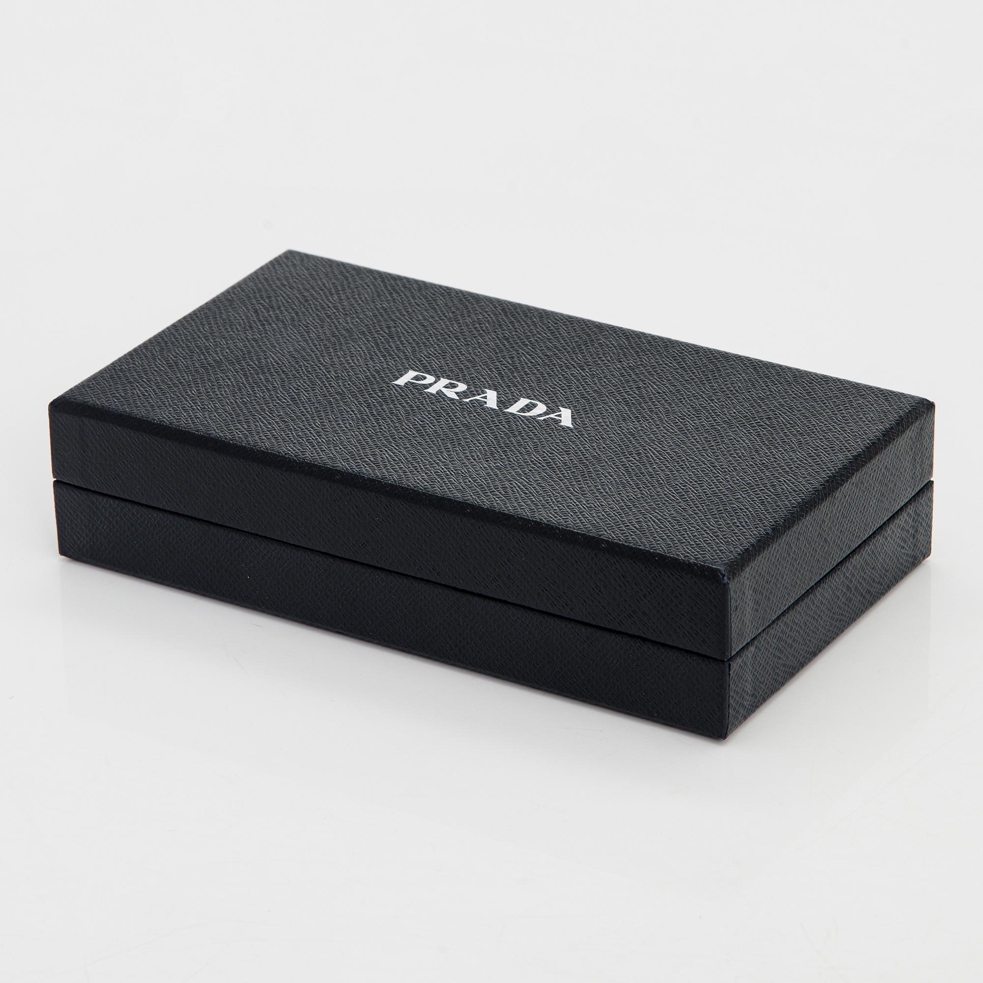 Prada, a wallet.