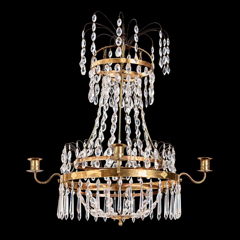 A late Gustavian four-light chandelier, early 19th century.