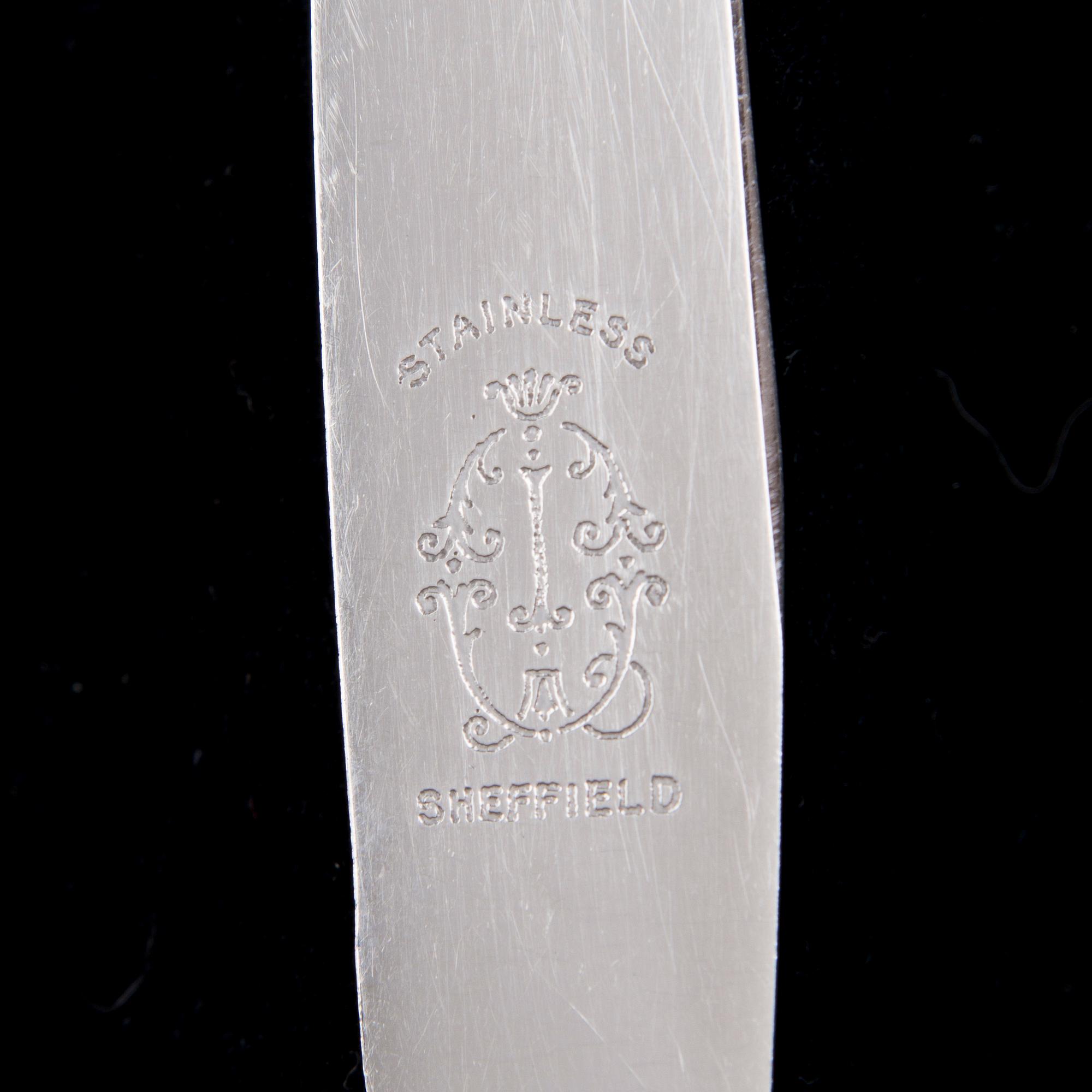BESTICK, 23 st, silver, "Musslan", finska och danska stämplar, 1900-talets början samt 2004.