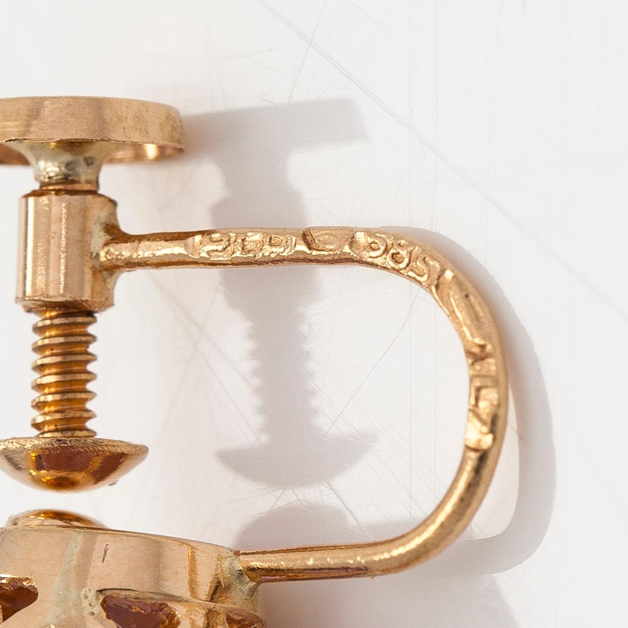 Örhängen, fasettslipade ametister, 14K guld.