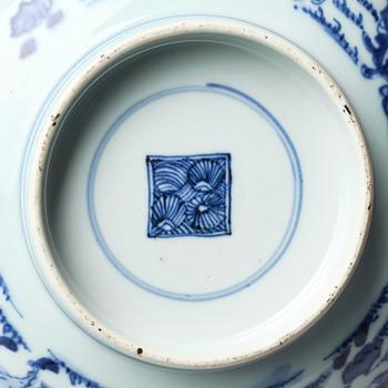 A blue and white 'foreigners bearing gifts' bowl, Qing dynasty, 18th century.