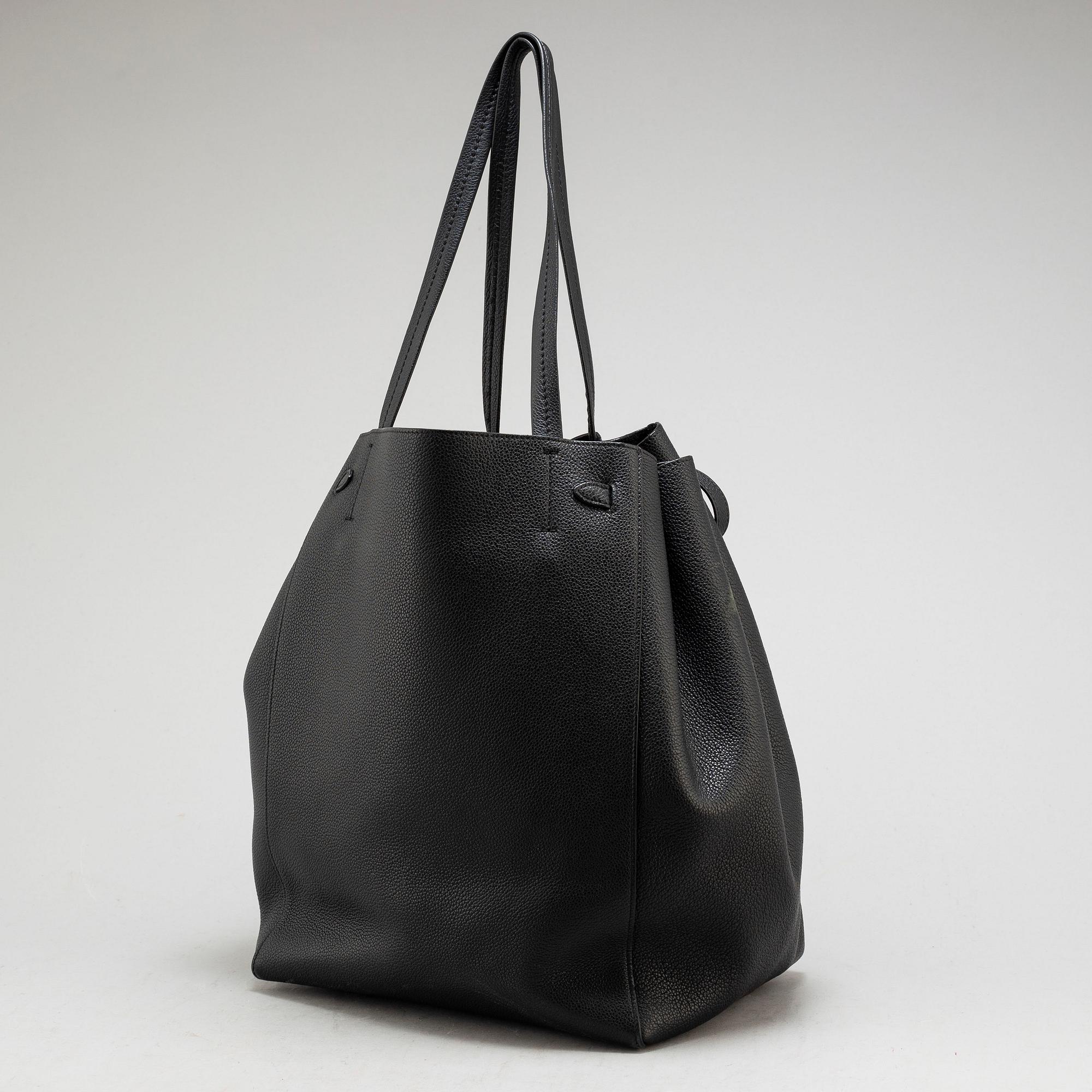 CÉLINE, a black calf leather 'Cabas Phantom' tote bag.