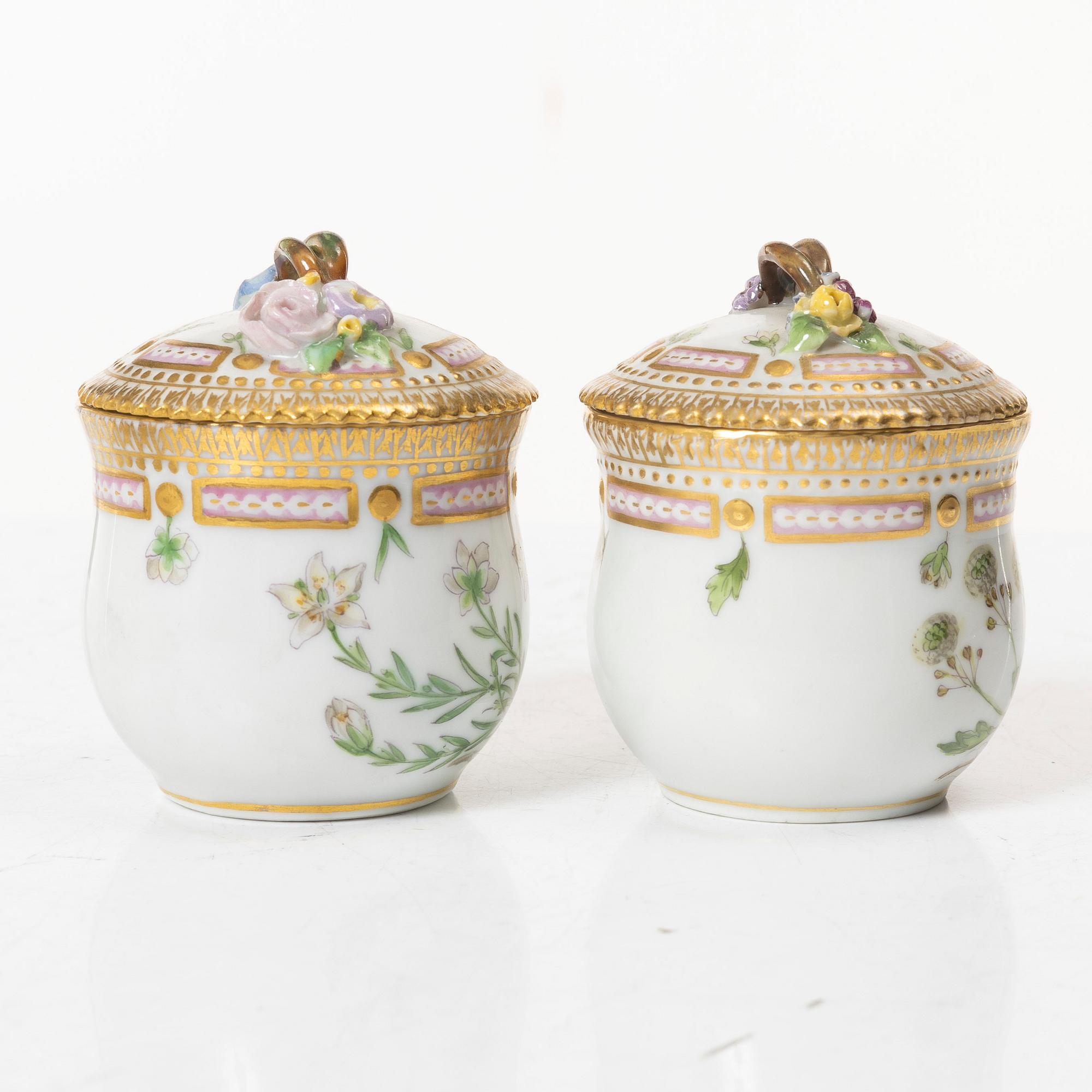 A pair of Royal Copenhagen 'Flora Danica' custard cups with covers and stands, Denmark, 20th century.