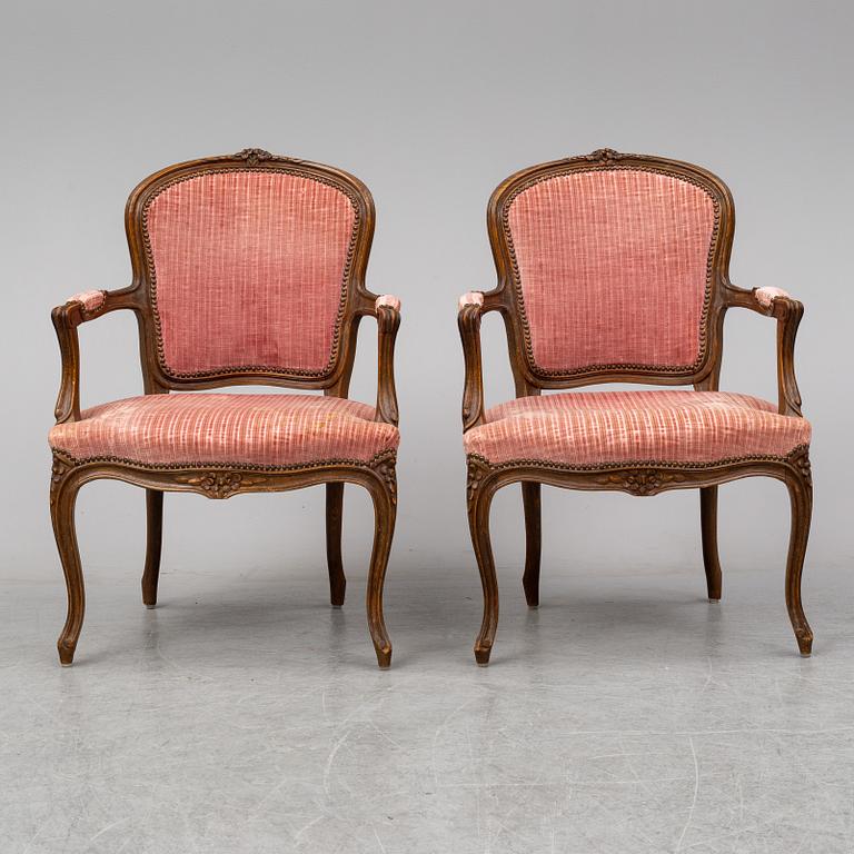 A pair of 19th-century rococo revival arm-chairs.