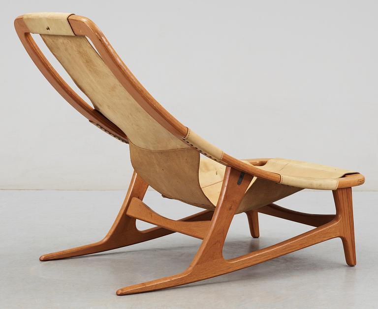 An Arne Tidemand Ruud teak and leather easy chair, by Norcraft,