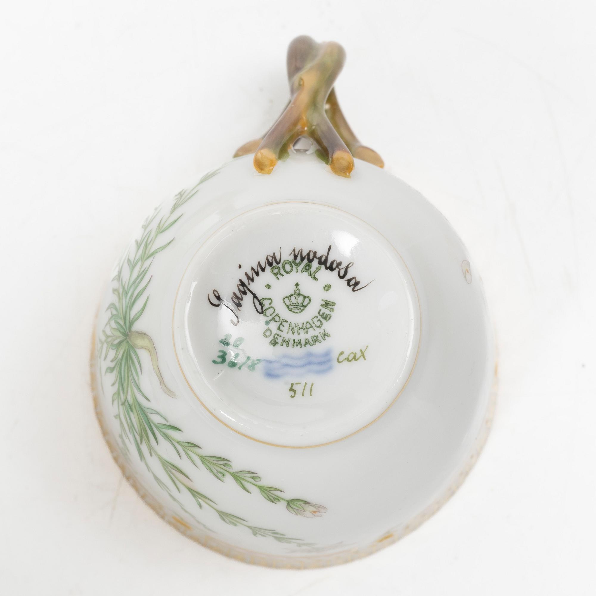 A Royal Copenhagen 'Flora Danica' coffee cup with stand, Denmark, 20th Century.