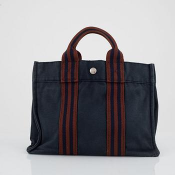 Hermès, "Fourre tout PM" bag and toiletry bag.