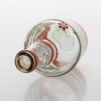 A set of 6 snapsglasses and a bottle designed by Aino Aalto for Karhula in the 1930-1940's.