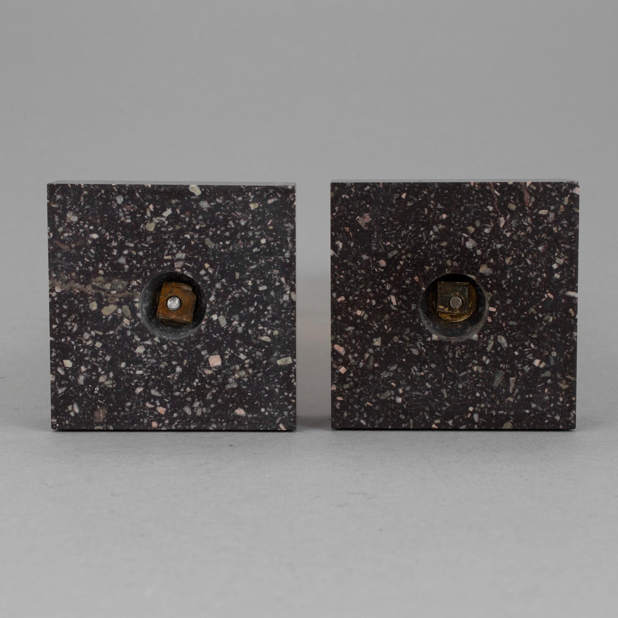 A pair of late gustavian porphyry candle sticks early 19th century.