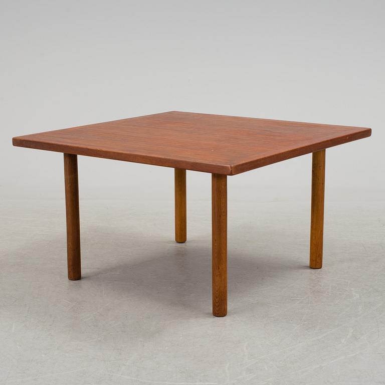 A 1960´s Danish Hans J. Wegner coffee table in oak and veneered with teak from Andreas Tuck.