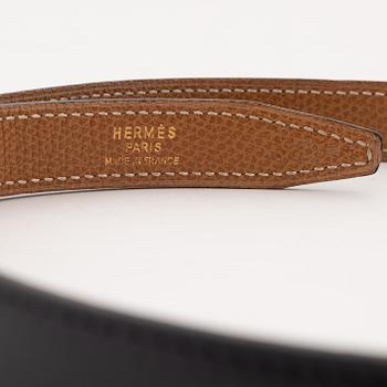 Hermès, a 'Constance' reversible leather belt, size 65, 1985.