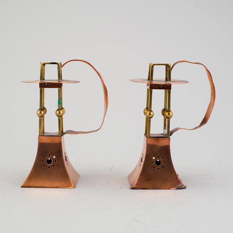 Pair of Art Nouveau brass and copper candlesticks by Carl Deffner.