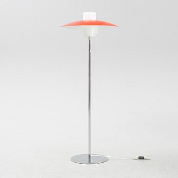 A chrome and plastic floor light, Luxus, Vittsjö.