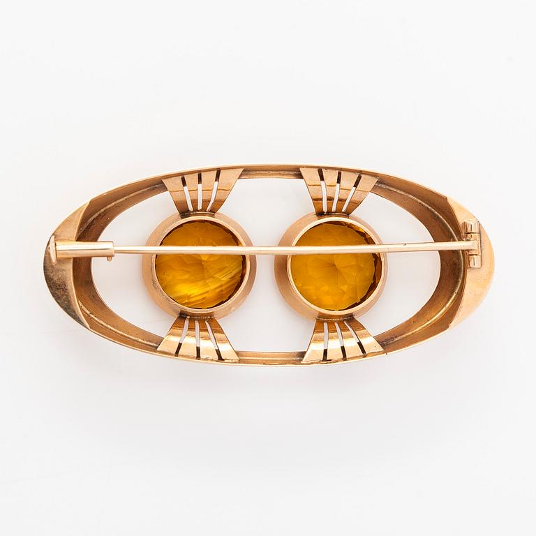 Brosch, 14K guld med citriner. Kaisaniemen Kello ja Kulta 1965.