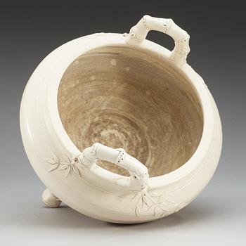 A large white glazed ceramic tripod censer, Qing dynasty, 19th Century, with Chenghua six character mark.