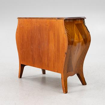 A Rococo style chest of drawers, mid-20th century.