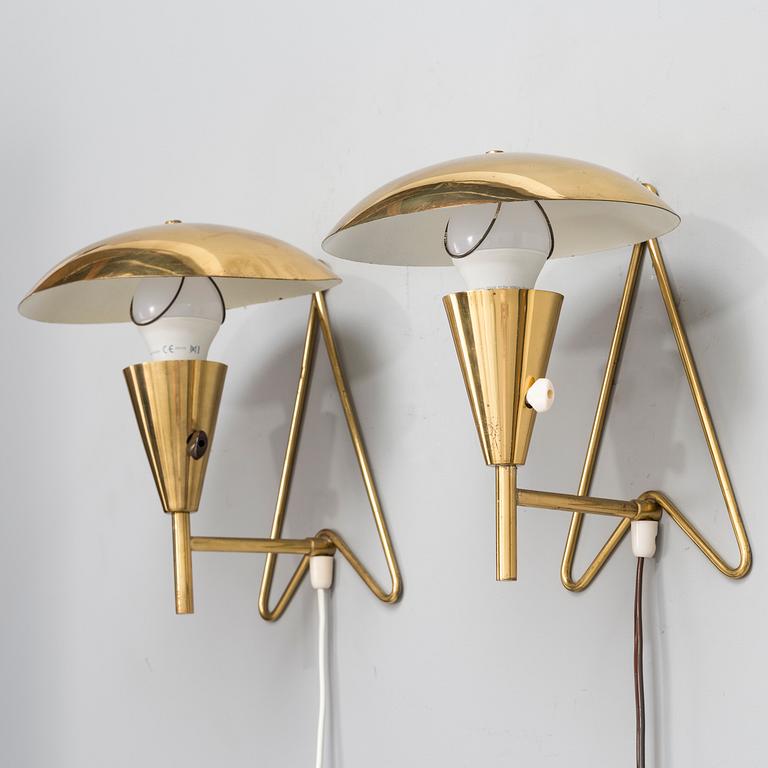 A pair of mid-20th-century wall lights / table lamps, model EV 57 for Itsu, Finland.