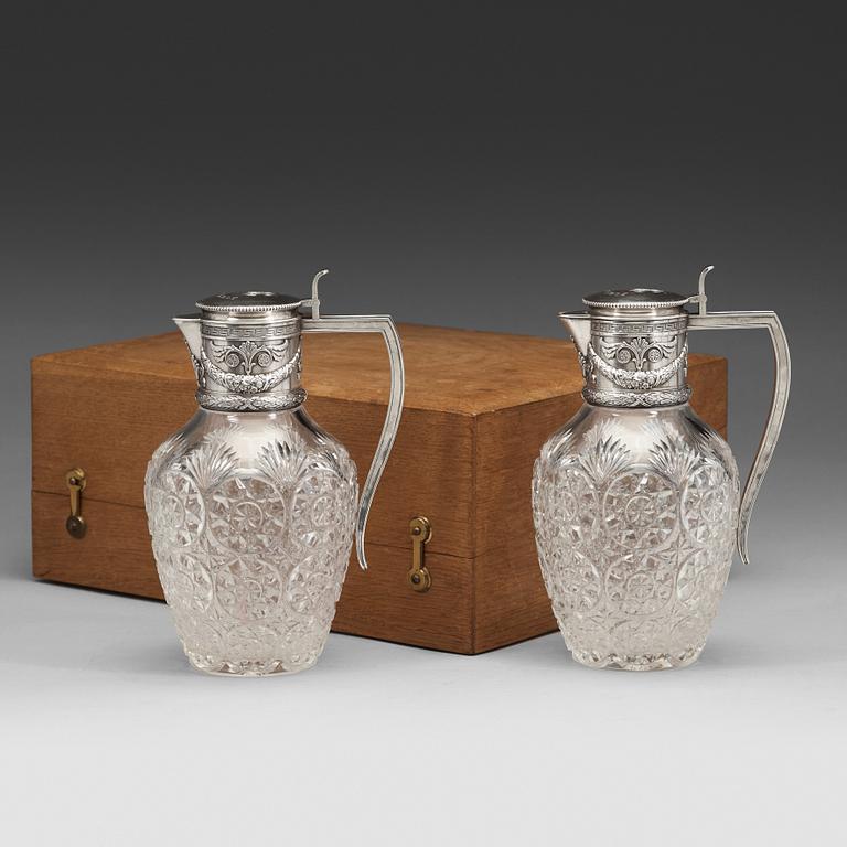 A pair of Fabergé jugs, glass and silver, Moscow 1899-1908, scratched inventori number 20116.