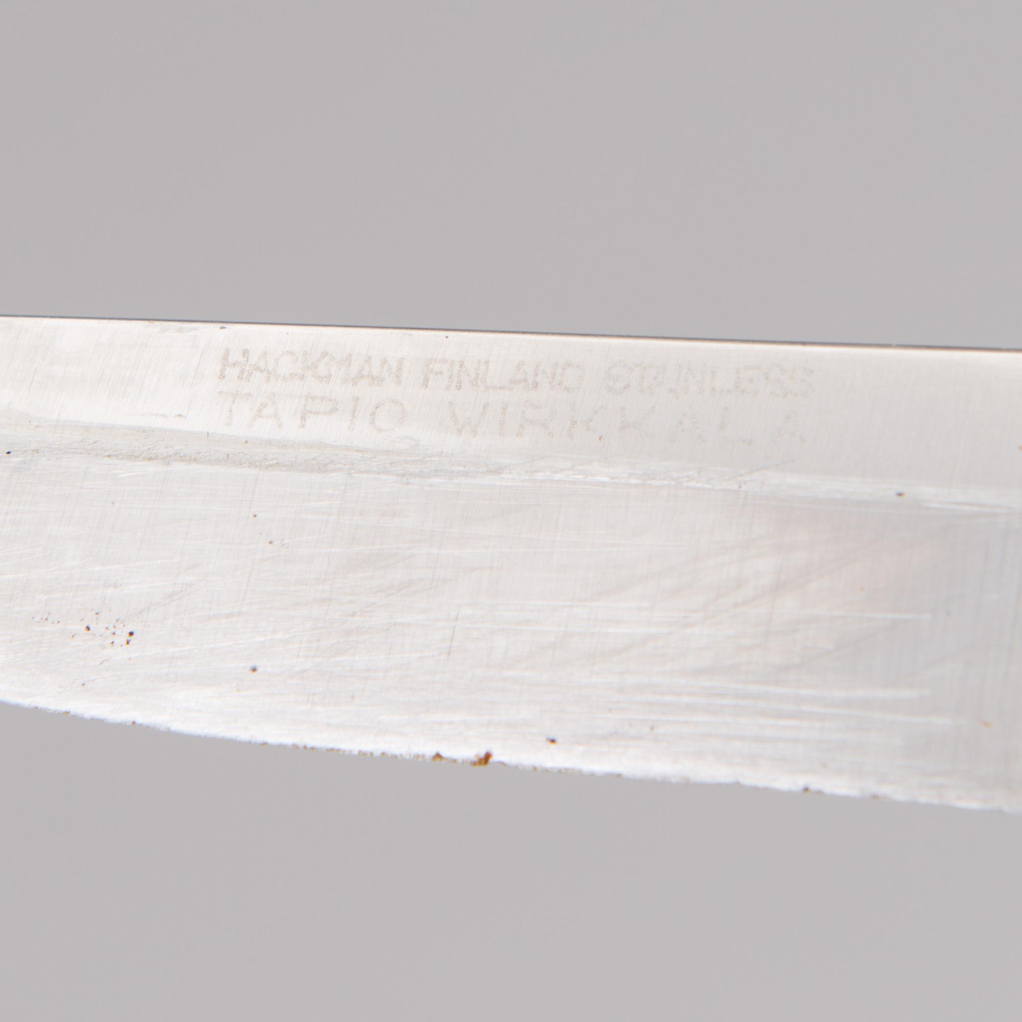 TAPIO WIRKKALA, PUUKKO-KNIV, rostfritt stål, nylon och mässing, Hackman Finland. Modellen formgiven 1961.