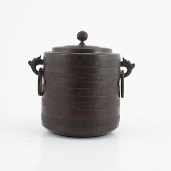 A Japanese bronze jar with cover, Meiji (1868-1912).