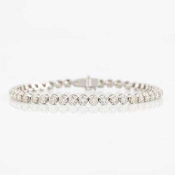 Tennis bracelet 18K white gold with brilliant-cut diamonds.