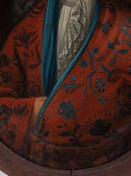 Man in embroidered coat.