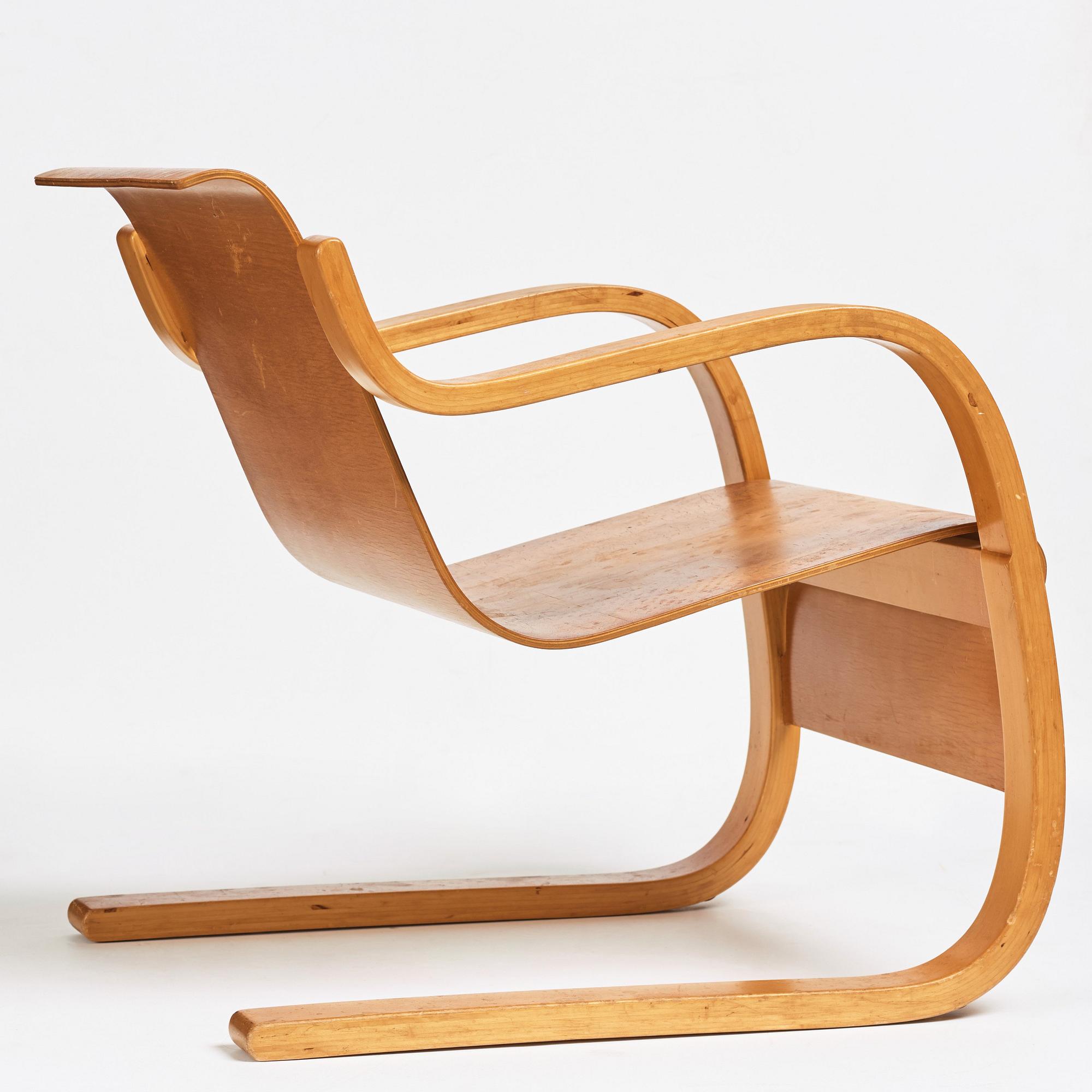 Alvar Aalto, a model nr 31 birch armchair, executed on license by Aalto Design Hedemora, Sweden 1945-54.