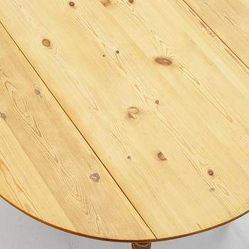 A folding table, early 20th Century.