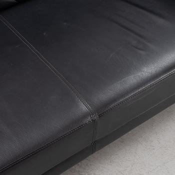 A leather upholstered sofa, 21st Century.