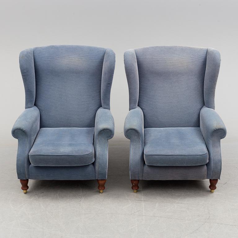 A pair of Parker Knoll 'York' wing chairs.